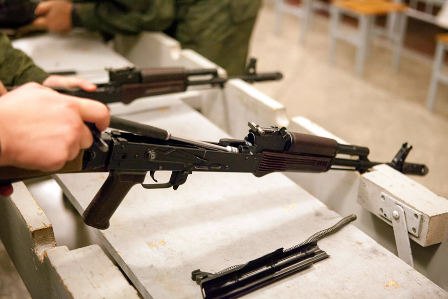 Disassembly of Kalashnikov automatic rifle.