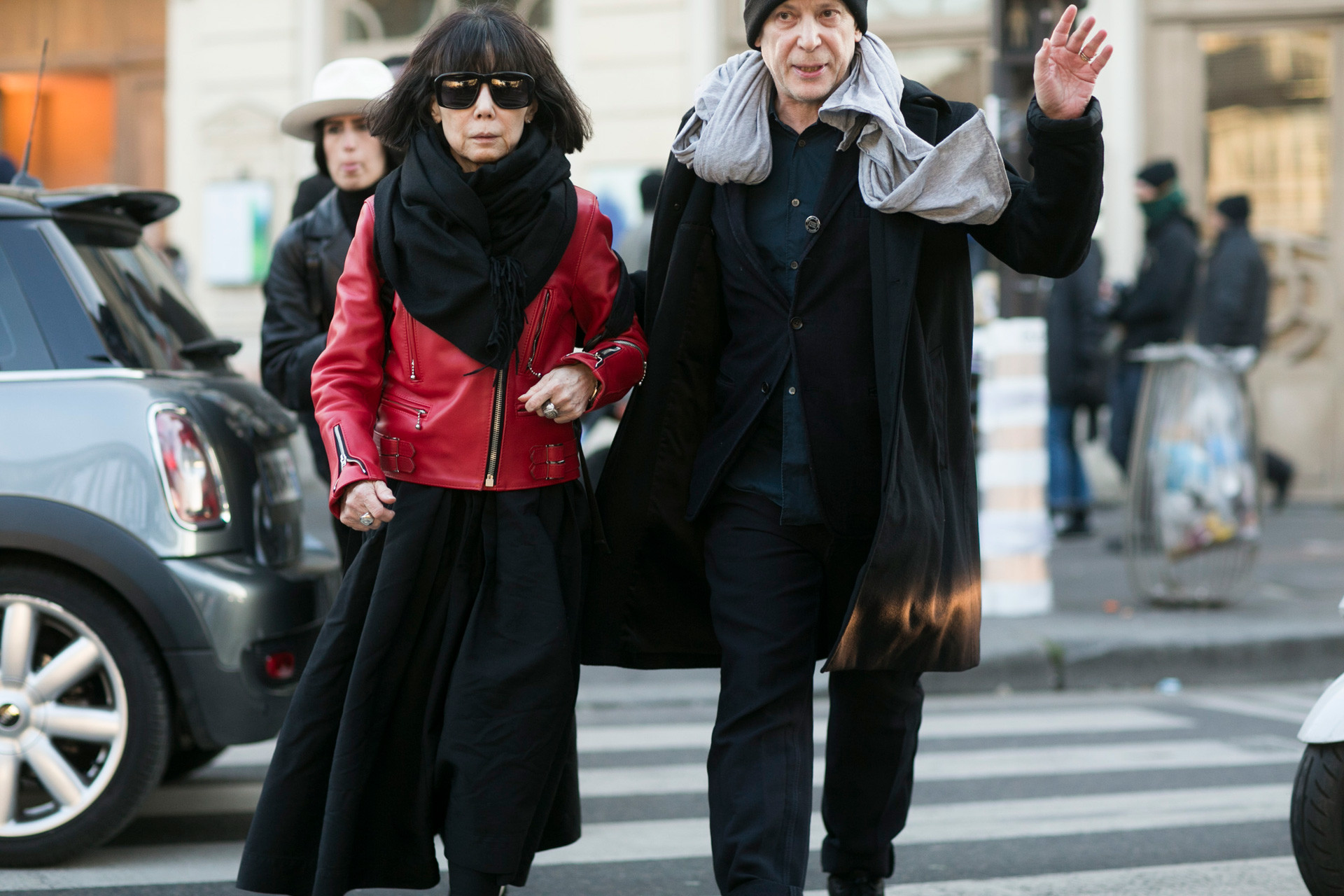 Rei Kawakubo, Comme des Garcons creative director, and Adrian Joffe, Dover Street Market and Comme des Garcons presiden, exit the Gosha Rubchinskiy show on Jan. 21, 2016 in Paris, France. 