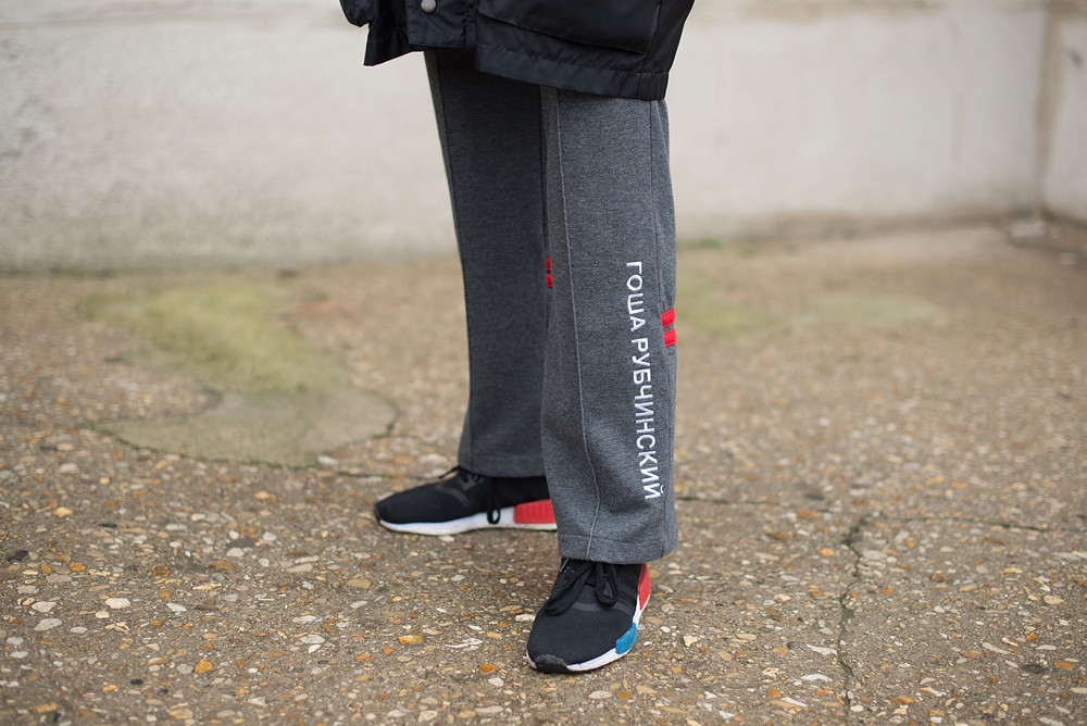 Leah Angeles poses wearing Gosha Rubchinskiy pants and Adidas shoes after the Maison Margiela show at the Grand Palais during Paris Fashion Week Womenswear FW 17/18. 