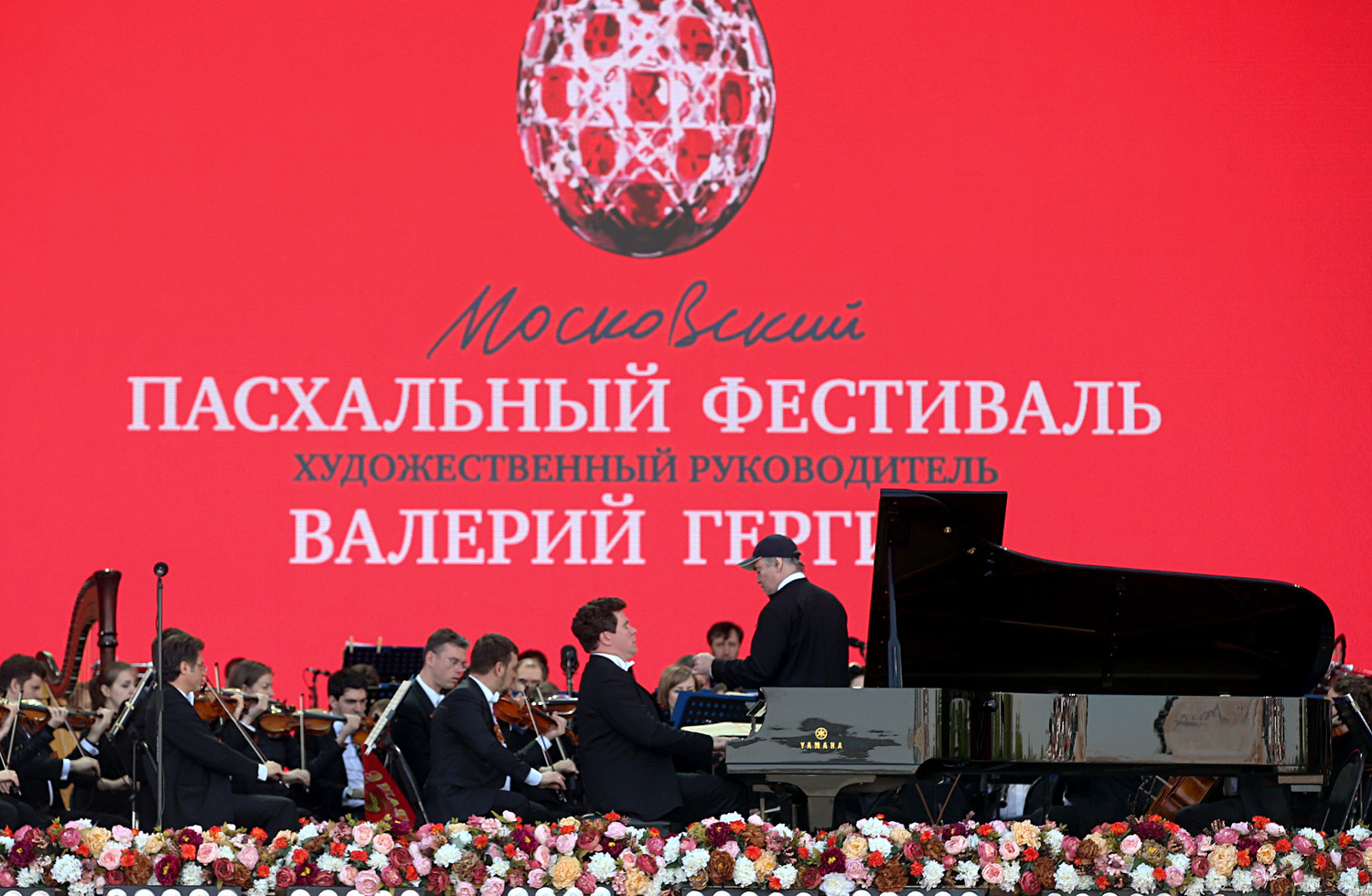 Valery Gergiev, Russian conductor, general director and artistic director of the Mariinsky Theatre, and Russian pianist Denis Matsuev perform during a Easter Festival on Moscow's Poklonnaya Hill.