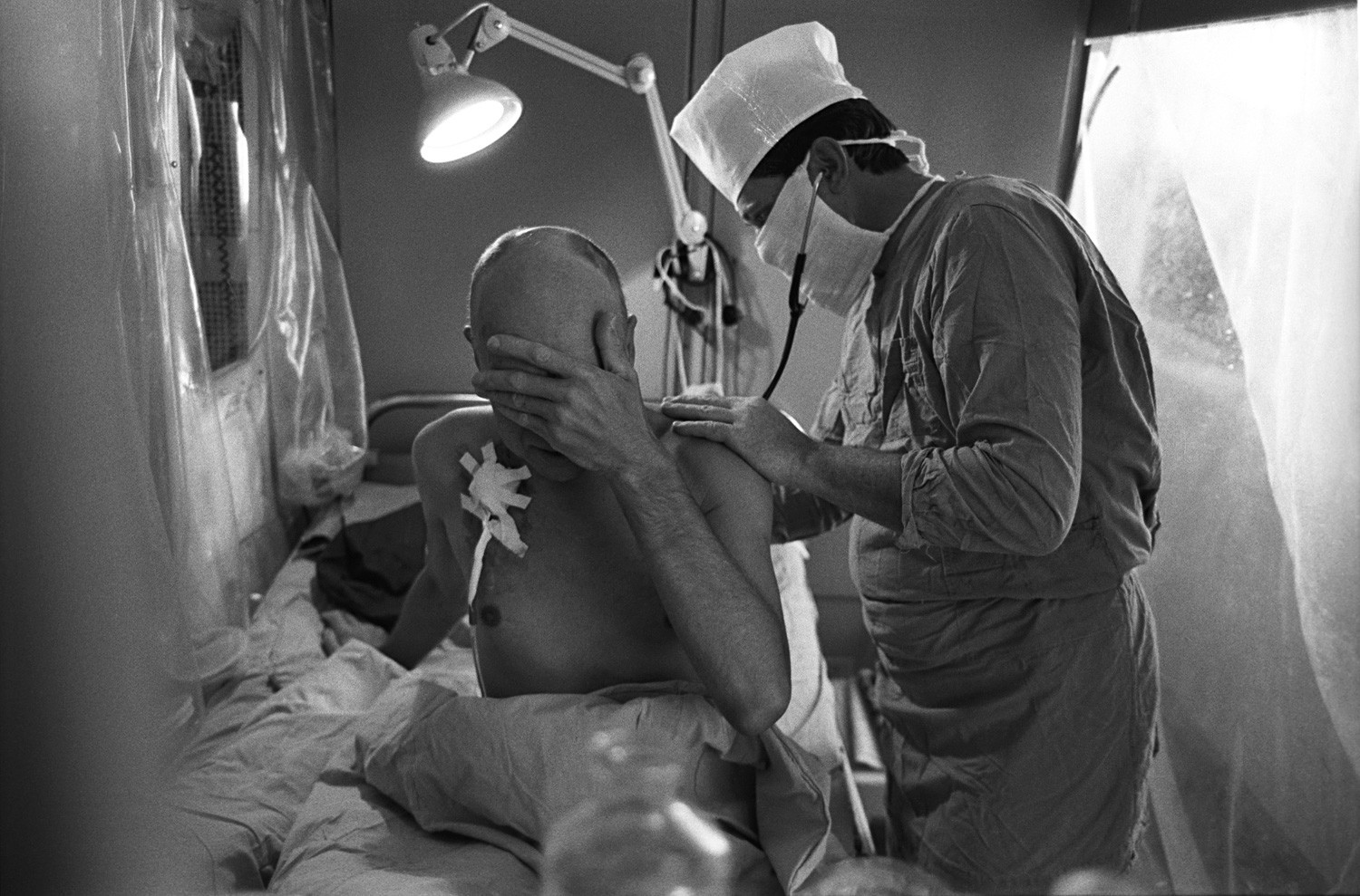 A liquidator being examined by a doctor in Moscow. Many liquidators suffered diseases after spending time at the nuclear plant.