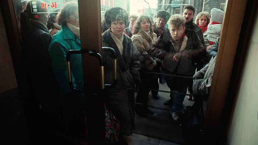 Russian citizens in Leningrad wait in line for the opening of a store during the Soviet economic crisis, January 01, 1987