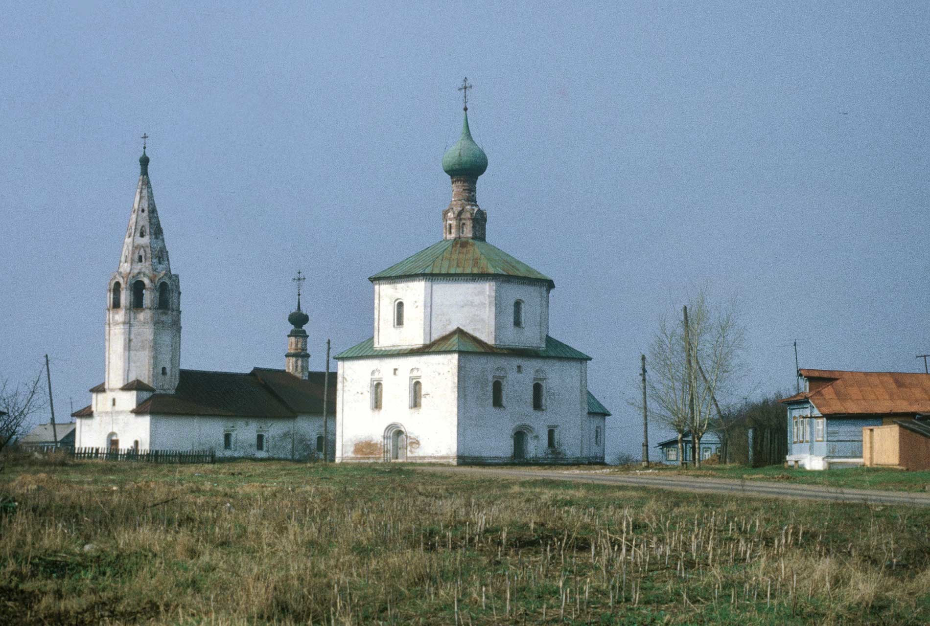 Suzdal. Church of Elevation of the Cross (left)&Church of Sts. Cosma & Damian in Korovniki. Southwest view. April 27, 1980.