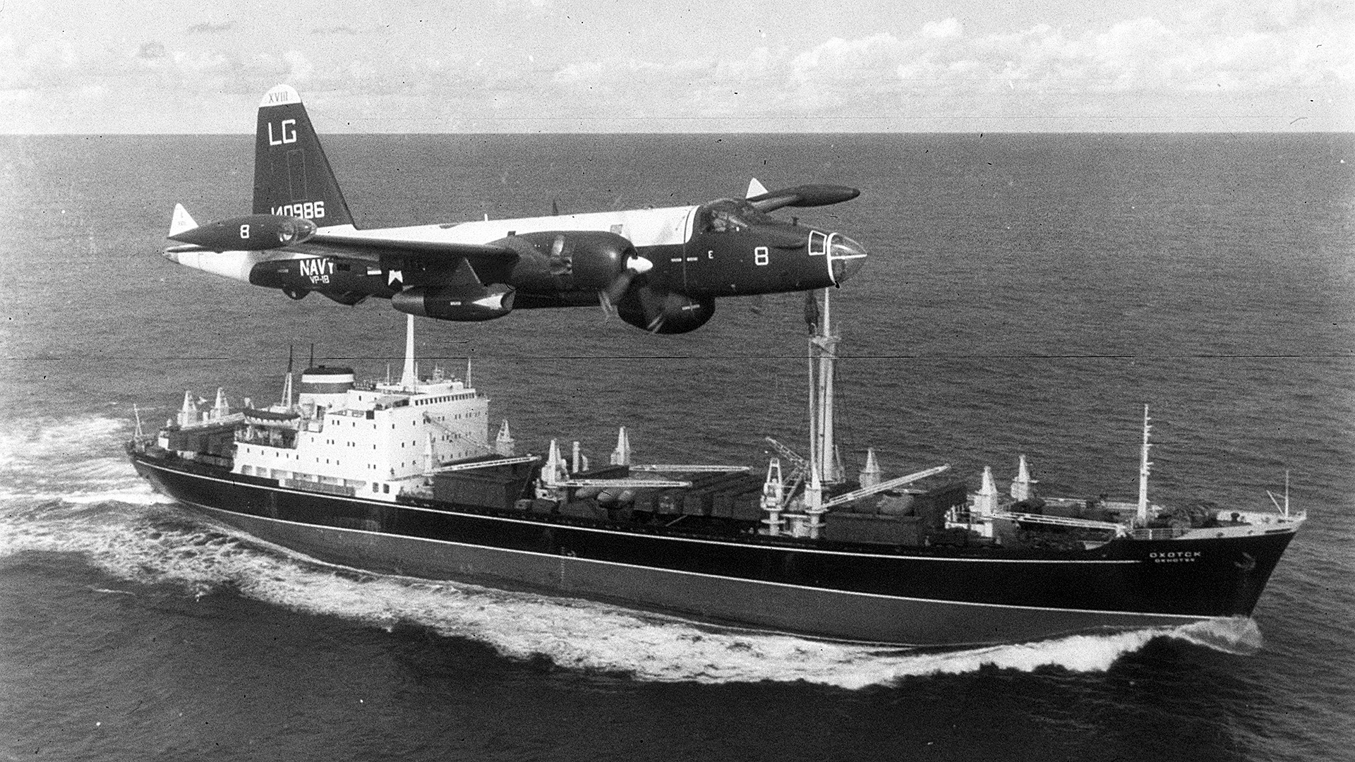 A P2V Neptune US patrol plane flying over a Soviet freighter during the Cuban missile crisis.