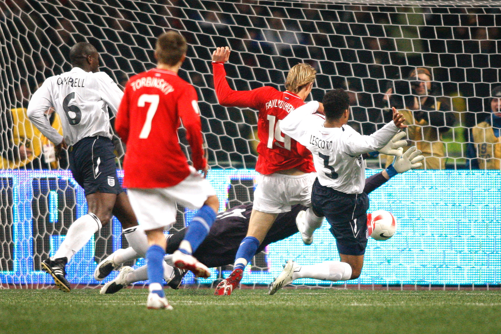 Roman Pavlyuchenko scoring in the match against England (2:1). This victory led Russia to the Euro, leaving the English team behind.