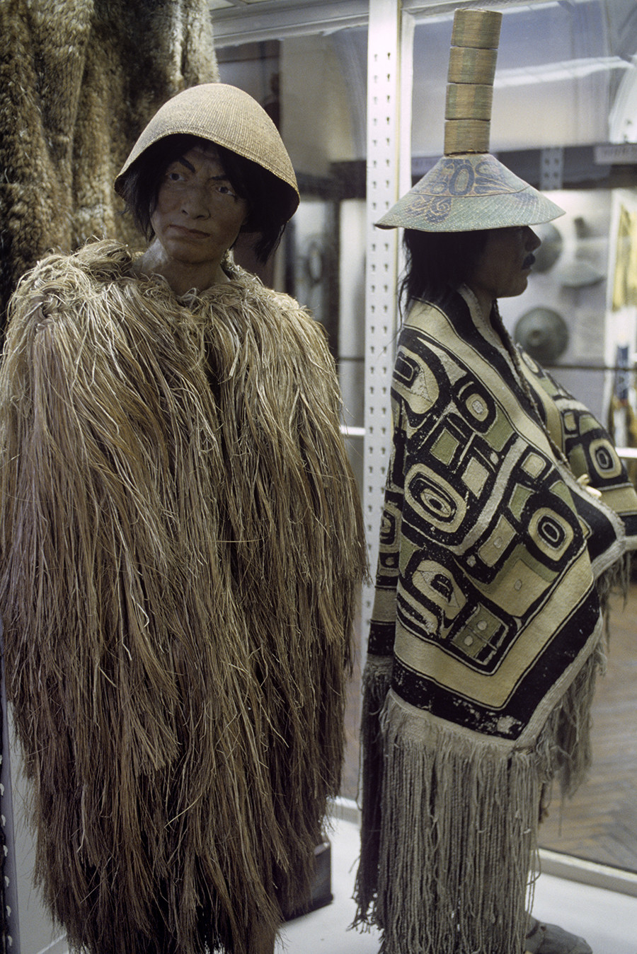 Native Americans wearing cloaks made of hay (left) and vegetable fibers. The 19th century. Showpiece of the Peter the Great Museum of Anthropology and Ethnography (Kunstkamera) of Russia's Academy of Sciences. 