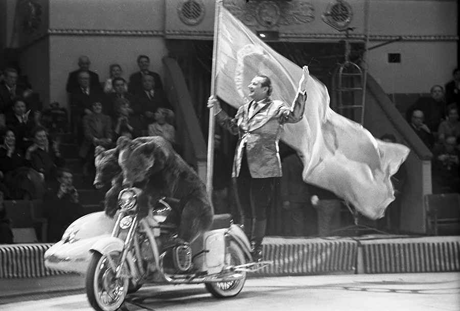 Valentin Filatov with trained bears during a show at the gala evening dedicated to the 50th anniversary of the Soviet circus. The Moscow Circus on Tsvetnoy Boulevard. 1969