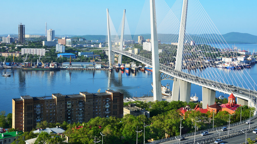 The bridge across the Golden horn bay in Vladivostok in cloudy weather, Russky Island