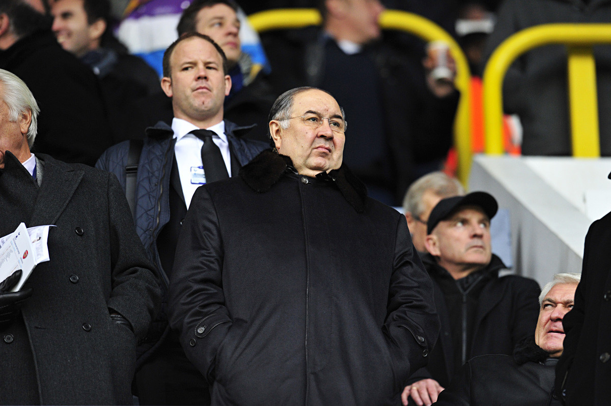 Alisher Usmanov watches the UEFA Champions League match between Arsenal and Bayern Munich in north London on February 19, 2013