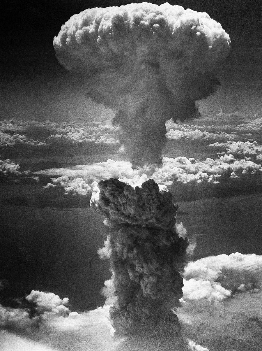 A mushroom cloud towers 20,000 feet above Nagasaki, Japan, following a second nuclear attack by the United States on August 9, 1945