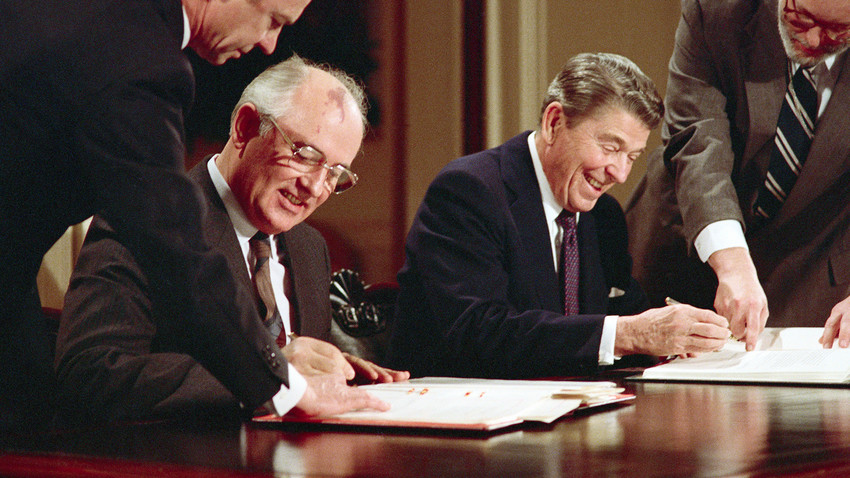 Mikhail Gorbachev and Ronald Reagan signing the historic INF treaty of 1987.