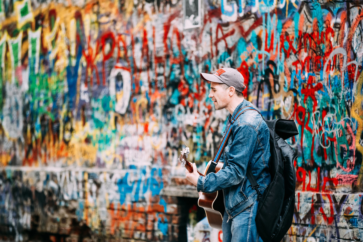 A street musician near Tsoi's Wall on Arbat Street, Moscow