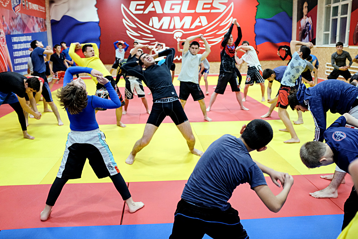 Adult fighters at the Eagles MMA club train young fighters who will soon be ready to replace them.