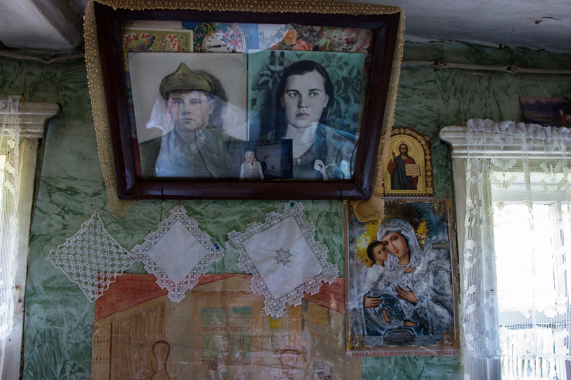 Portraits of Lyuska's mother and her husband killed in WWII