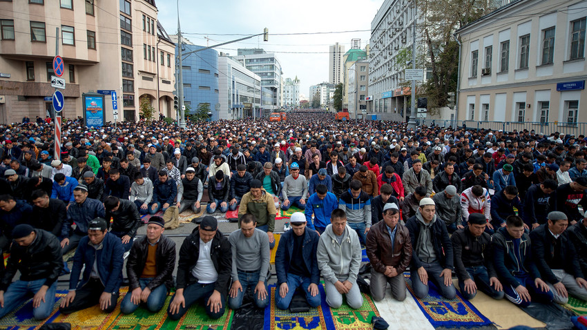 Muslims attend a morning prayer to mark Eid al-Adha in Moscow. 