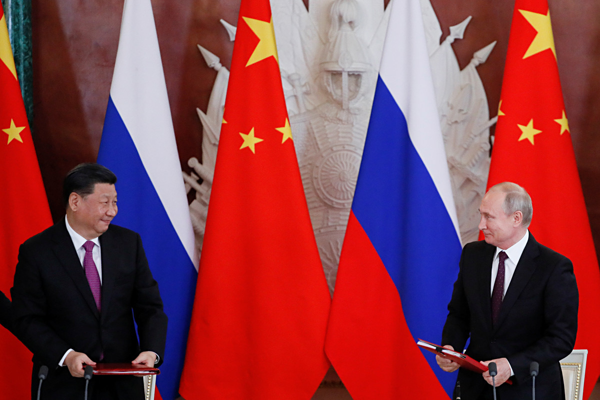 ロシアのウラジーミル・プーチン大統領と中国の習近平国家主席。2019年6月5日。