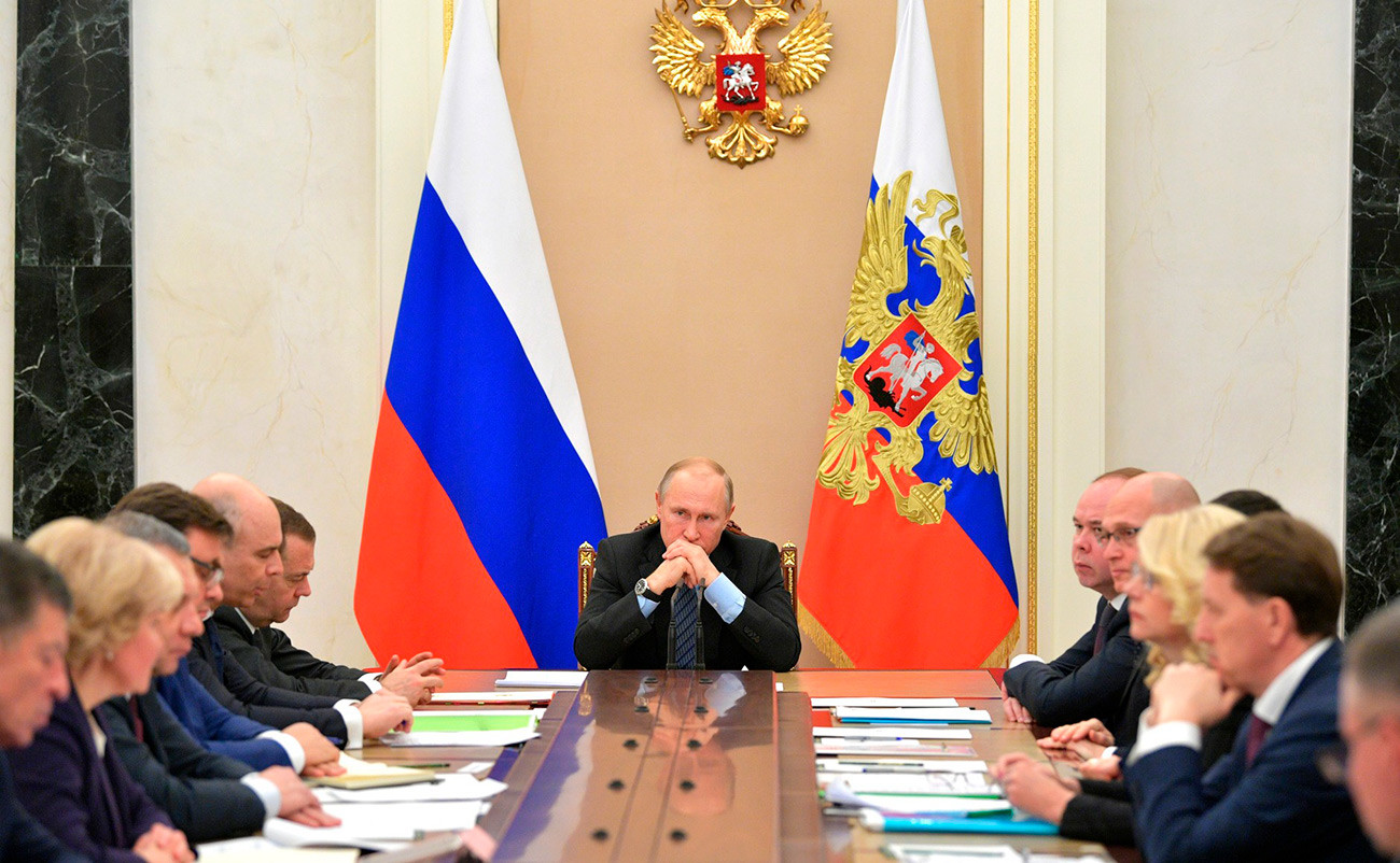 Präsident Wladimir Putin und die russische Regierung