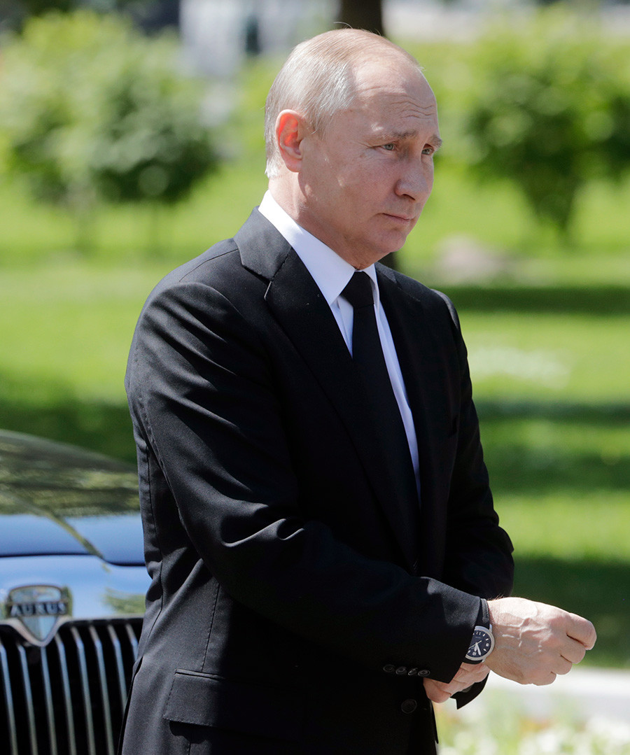 Russia's President Vladimir Putin attends a wreath-laying ceremony at the Tomb of the Unknown Soldier by the Kremlin Wall on June 22, 2018.