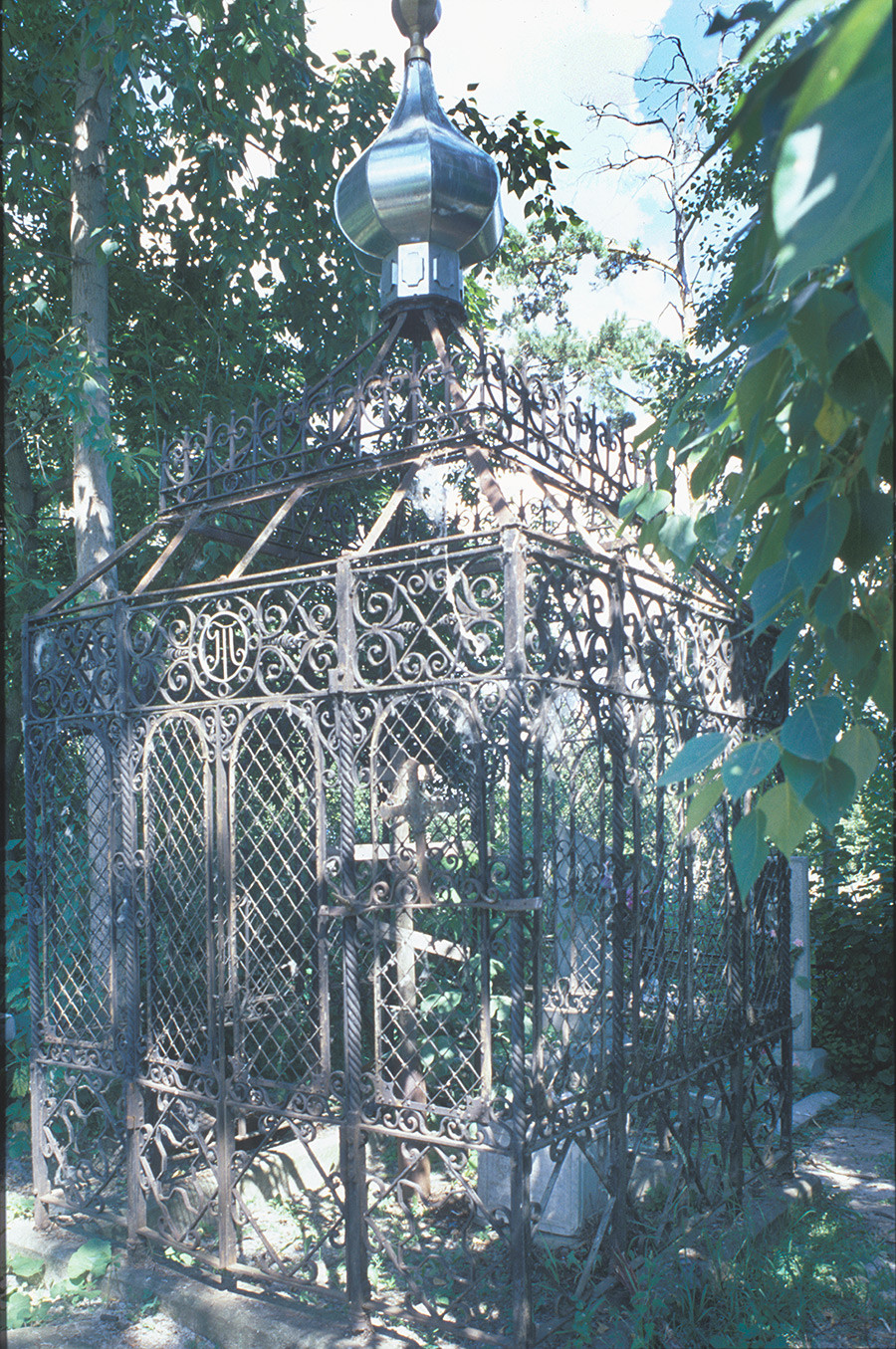 Kasli Cemetery. Burial plot enclosed with Kasli decorative iron work. July 14, 2003 