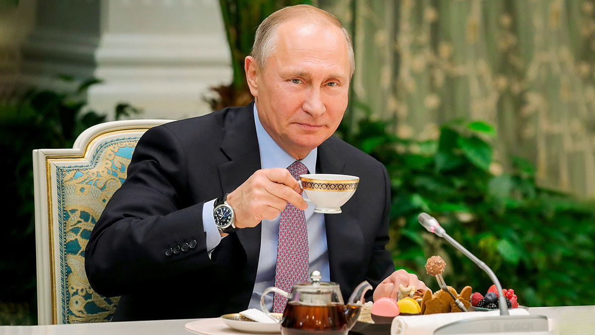Vladimir Putin drinking tea