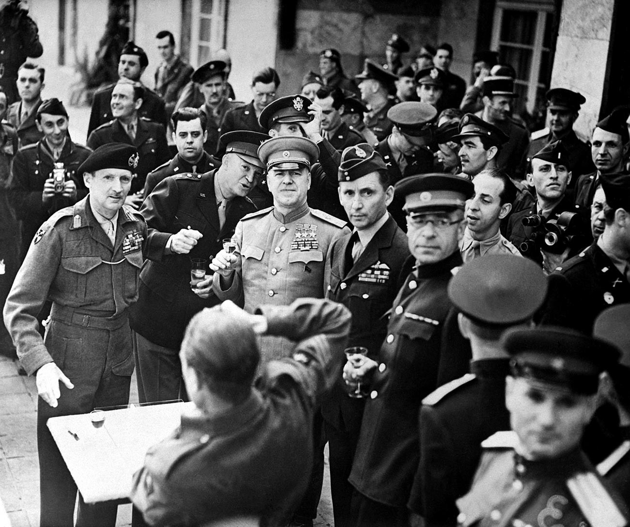 British Field Marshal Bernard Montgomery (left, wearing beret) was awarded the Order of Victory on June 5, 1945. American general Dwight Eisenhower and Soviet field marshal Georgy Zhukov, also recipients of the Order of Victory, are to the right of Montgomery. 