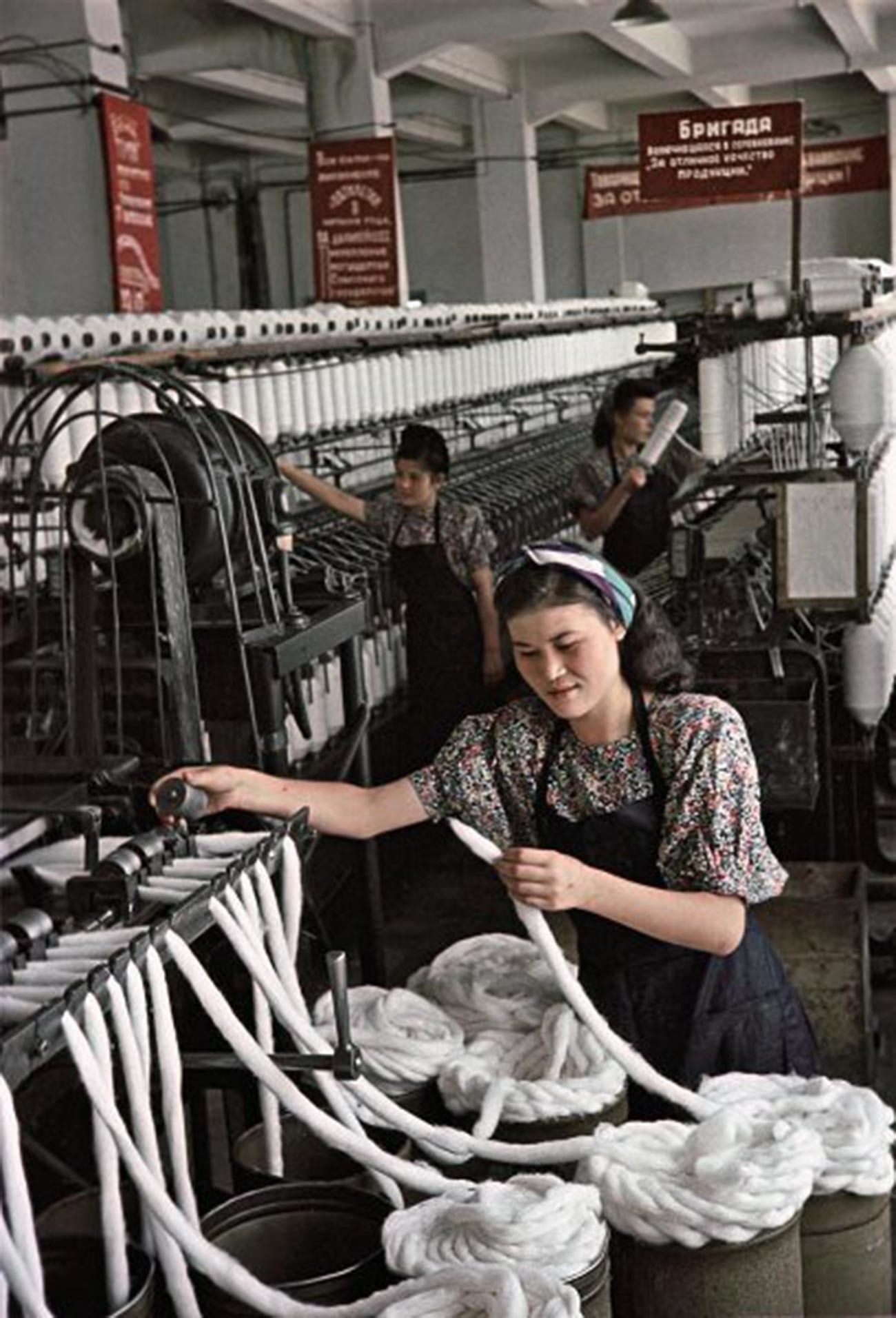 Stakhanovite Maria Nasilbayeva, a worker at the Alma-Ata cotton mill, grew up in an orphanage. Her team fulfills the production plan by 200 percent. From the archive of Ogonyok magazine; 1950.