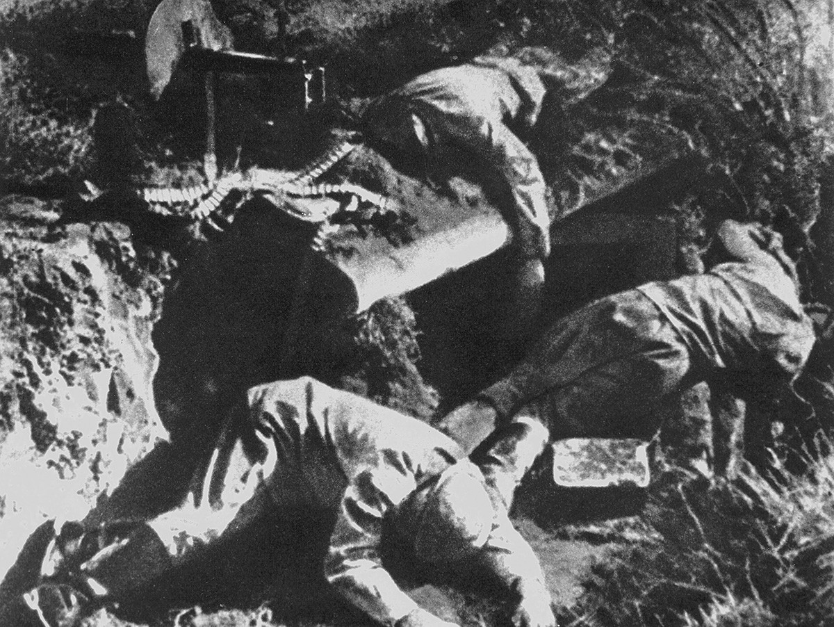 Corpses of Soviet soldiers lying next to their machine gun, in the ruins of  Brest Fortress.