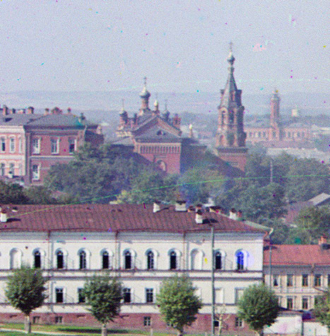 Perm. Detail of view west from City Hillocks. Center: Bell tower and Church of St. Nicholas, attached to the Mariinsky Women’s High School. Right background: central fire station & watchtower. Summer 1909