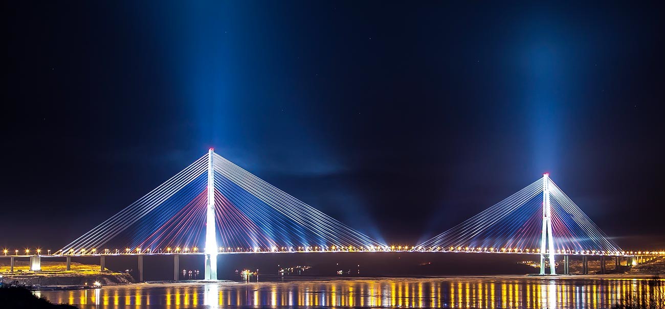 Russky Bridge in colors of the Russian national flag: white, blue, red