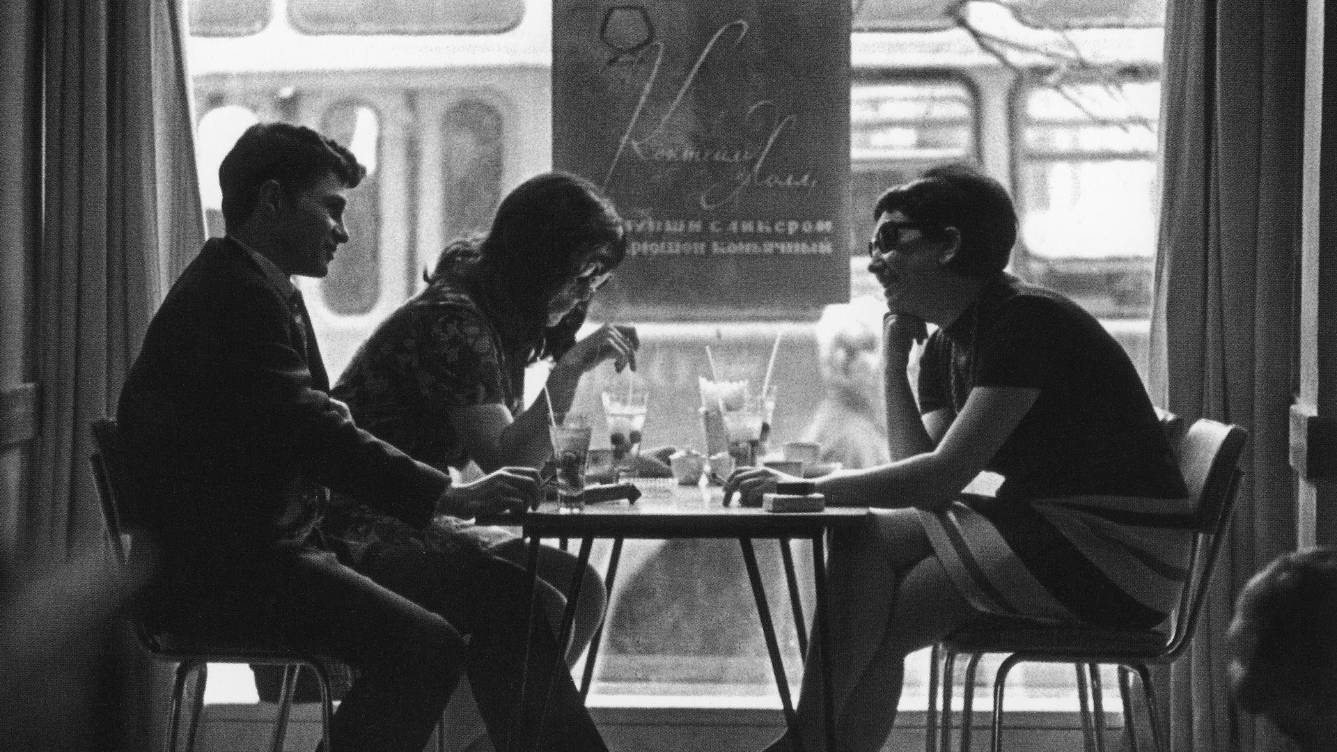 Youth in Moscow, USSR, drinking cocktails in a western style cafe 