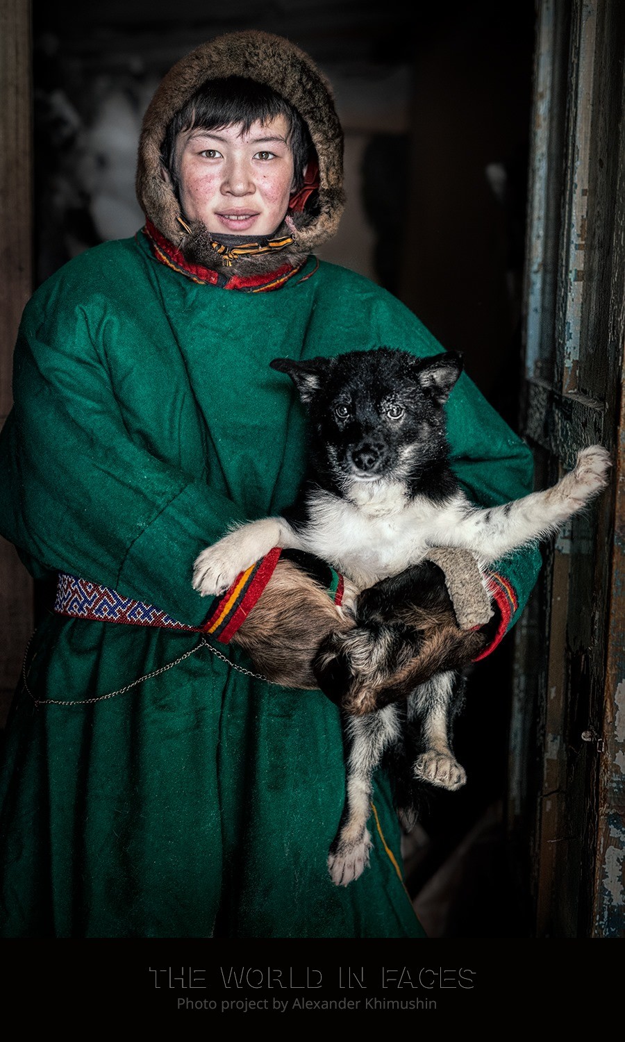 A young Nenets man with a dog.