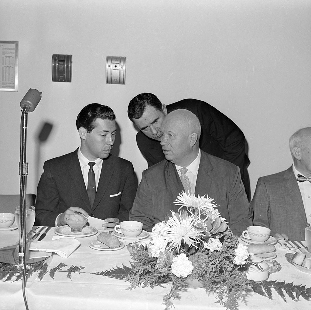 Soviet Premier Nikita Khrushchev listens to his Foreign Minister Andrei Gromyko during a luncheon at the United Nations. On Khrushchev's right is Viktor Sukhodrev.