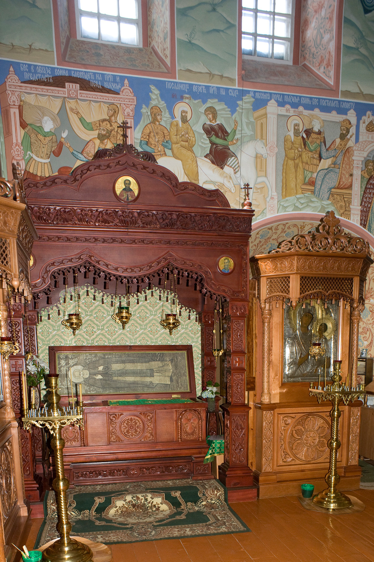 St. Avraamy Epiphany Monastery. Church of St. Nicholas over Holy Gate, Interior, north wall with sarcophagus containing relics of St. Avraamy of Rostov. July 6, 2019
