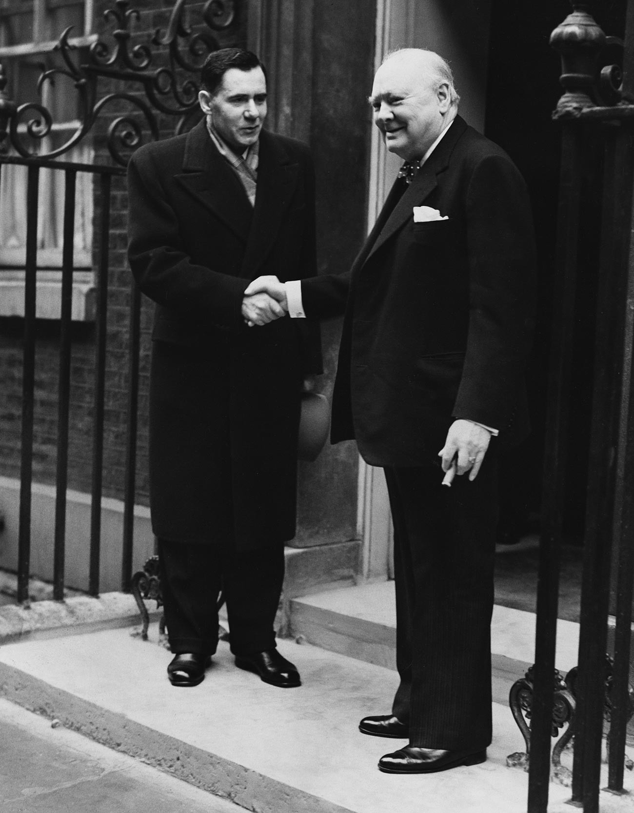 Andrei Gromyko, who became the Russian Ambassador to the UK in 1952, shakes hands with the Conservative Prime Minister, Winston Churchill outside 10 Downing Street.