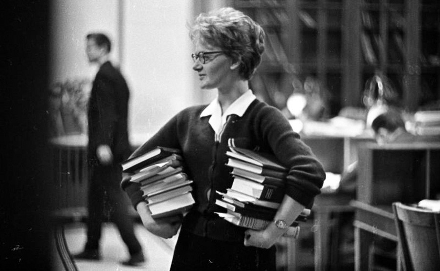A student with books, 1963–1964.