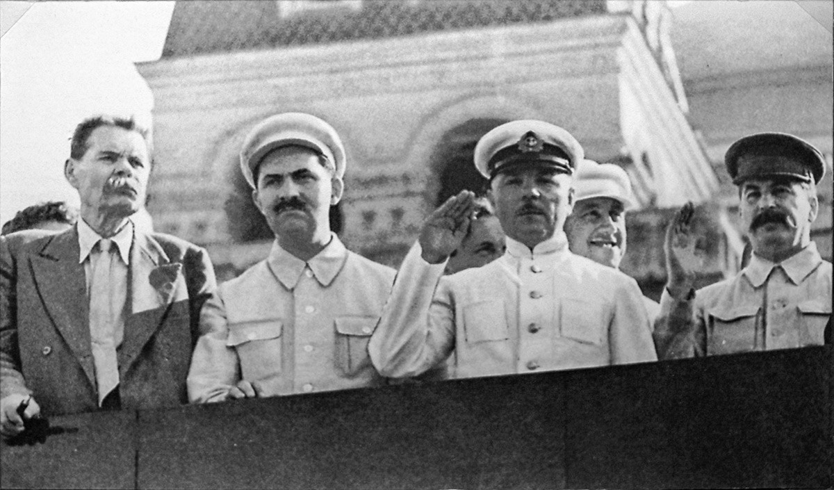 Maxim Gorky, Lazar Kaganovich, Kliment Voroshilov, Joseph Stalin on top of Lenin's mausoleum 