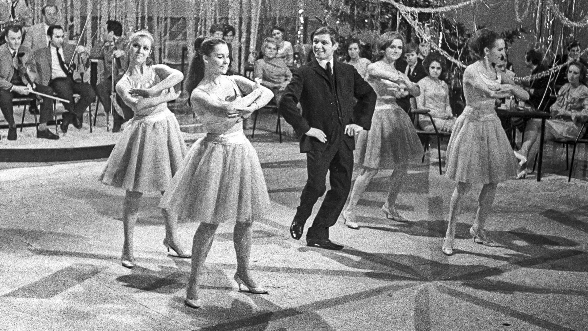 Moscow, USSR. Singer Eduard Khil and dance band “Alye parusa” perform at the Central Television in the TV show “Little Blue Light."