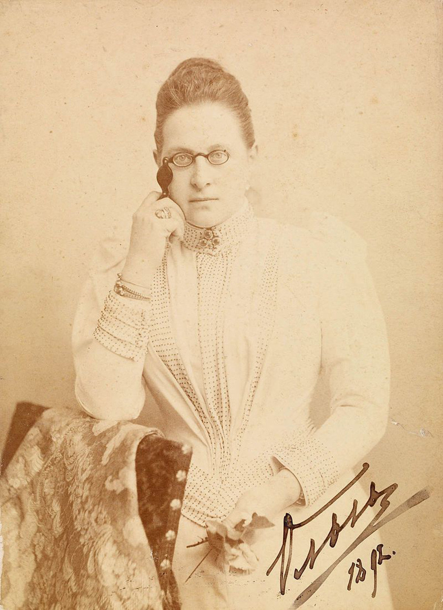 Grand Duchess Olga Konstantinovna using a lorgnette
