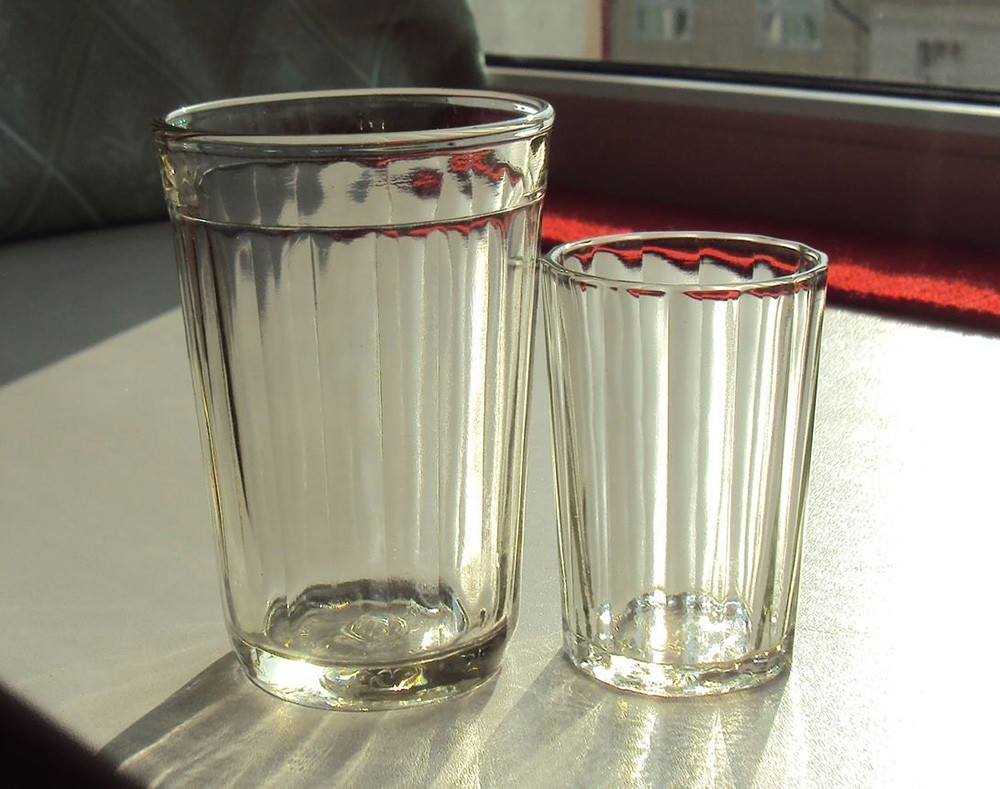A 250-gram glass (L) and a 100-gram glass (R) 