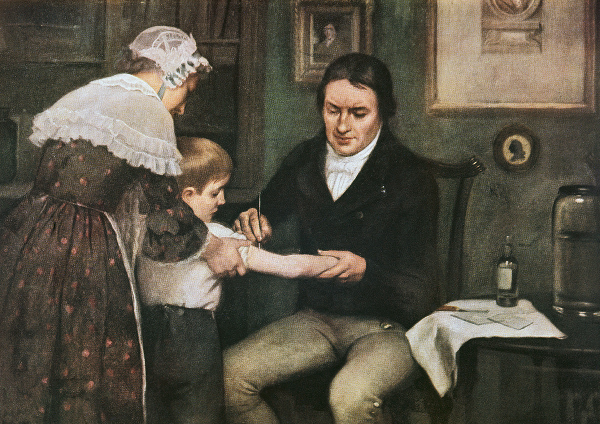 Dr Edward Jenner (1749-1823) performing his first vaccination against smallpox on James Phipps, a boy of eight, May 14, 1796, oil on canvas by Ernest Board (1877-1934).