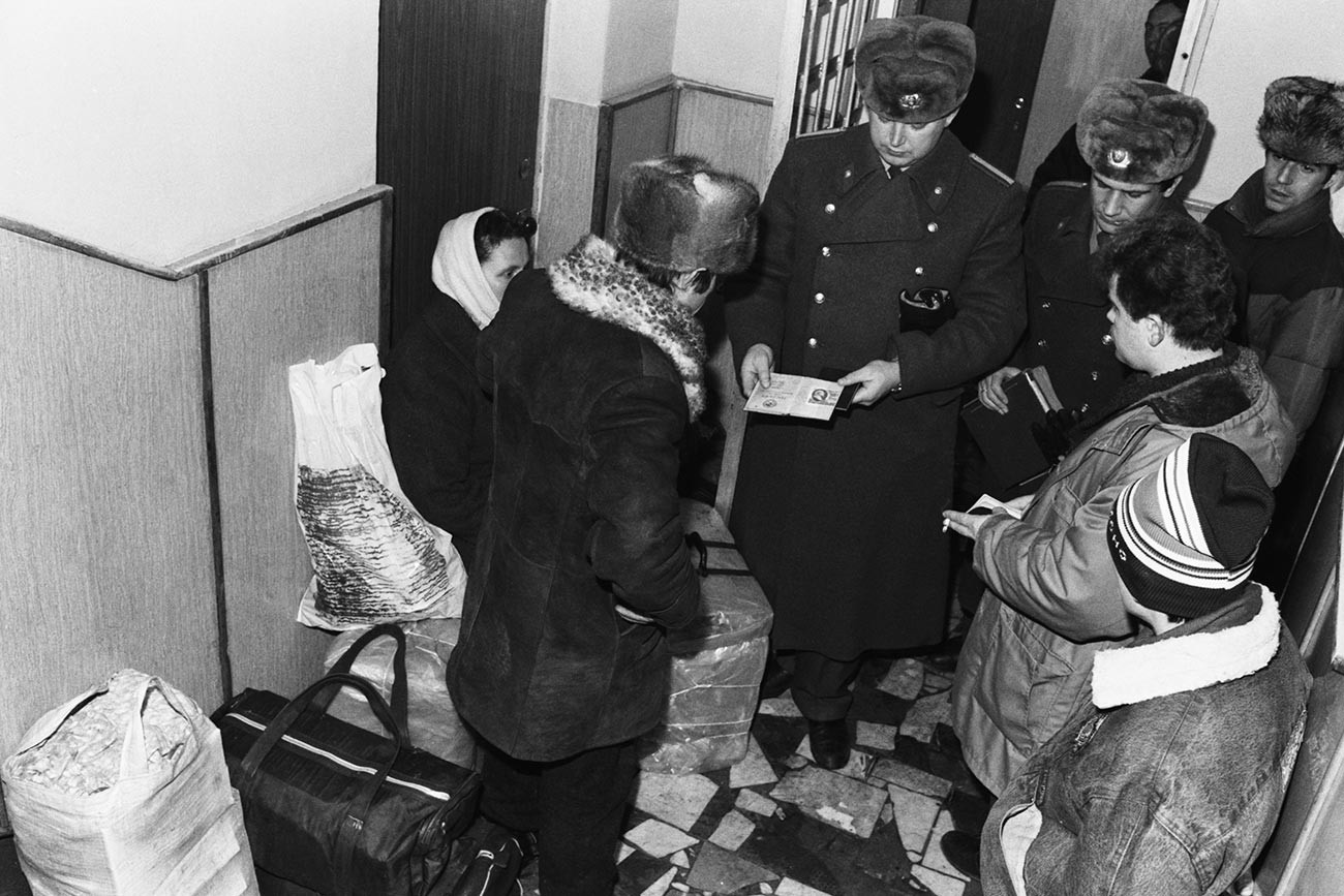 In a Soviet militia precinct, checking the propiska