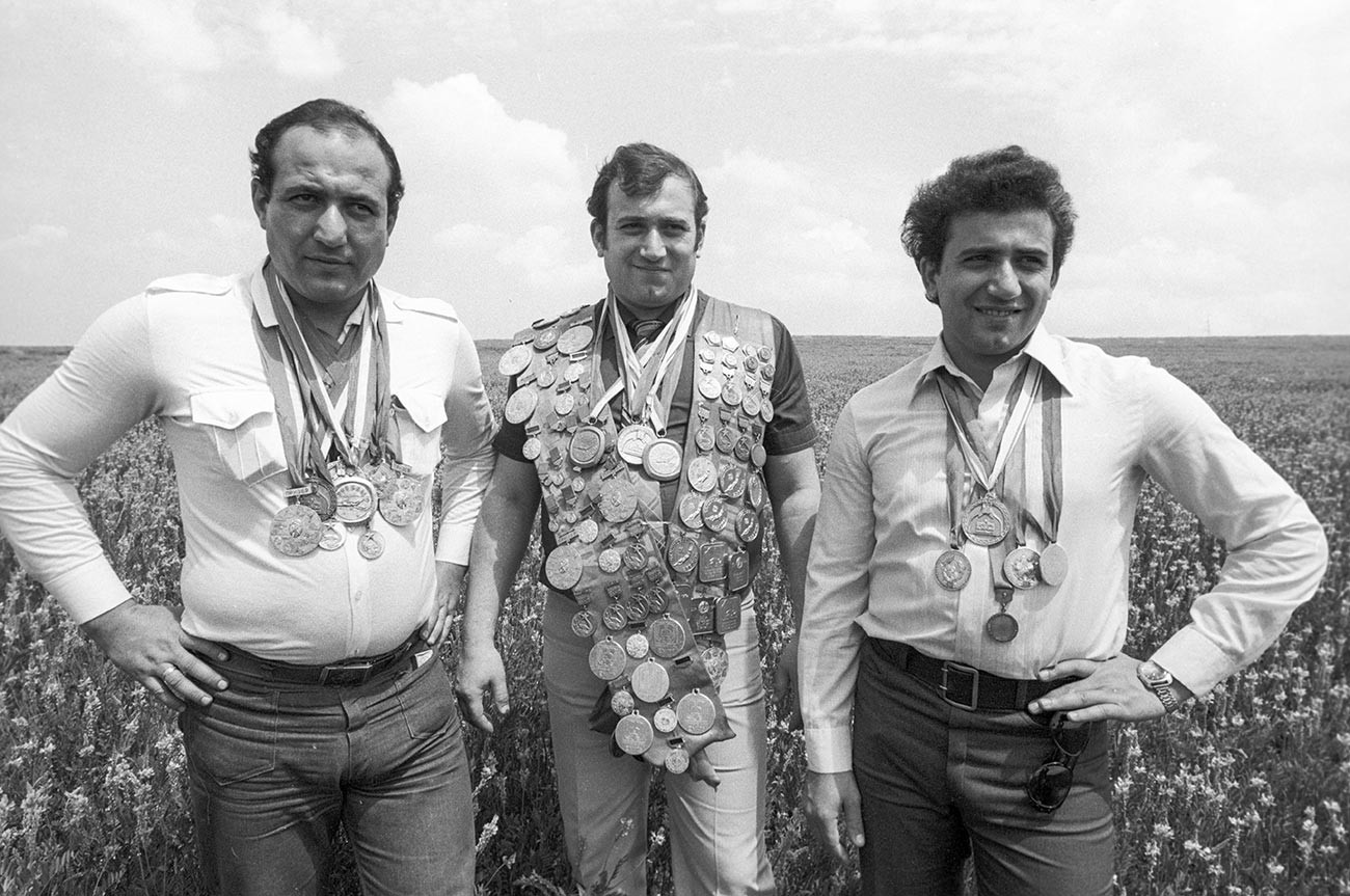 Pictured L-R: swimming coach Kamo Karapetyan, Shavarsh Karapetyan, children coach Anatoly Karapetyan, 1983