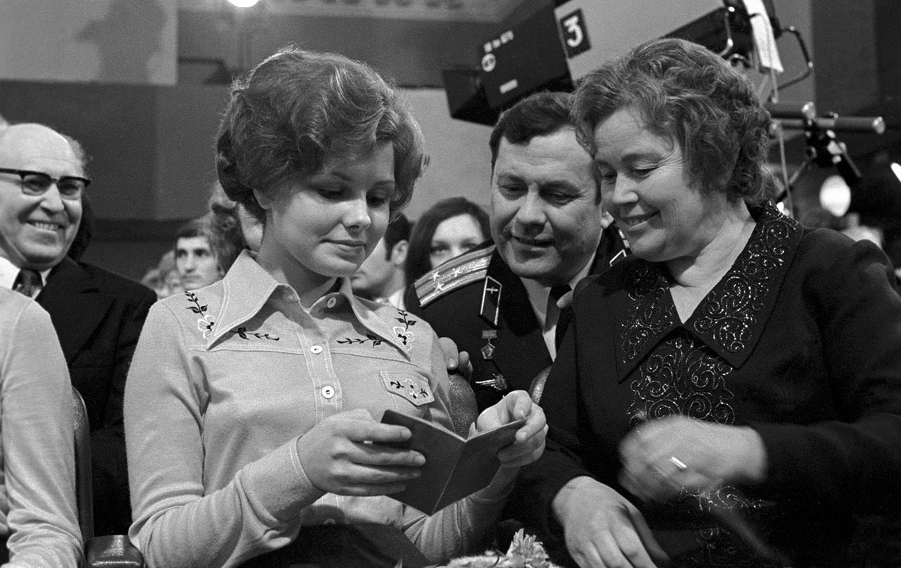 Elena Gagarina, daughter of Yuri Gagarin, receives the passport of a Soviet citizen.