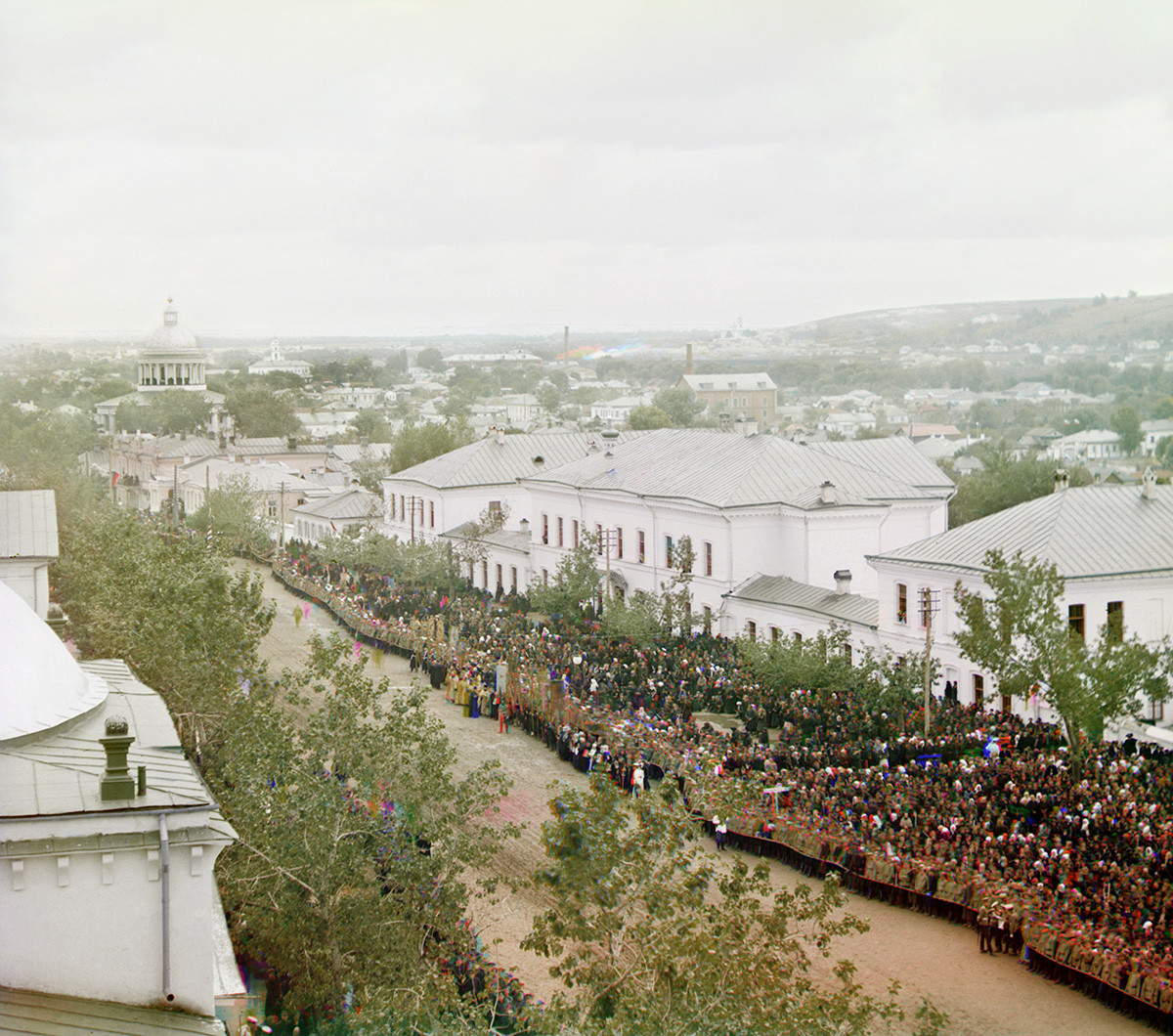 Cathedral Square, view east from Trinity Monastery bell tower on September 4, 1911. Dignitaries & crowds gathered for Procession of the Cross in homage to the canonization of St. Ioasaph. Left distance: domed Cathedral of the Nativity of the Virgin Convent