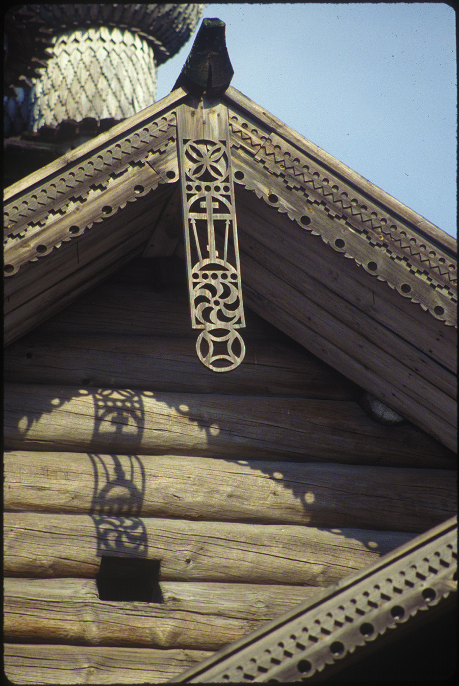 Church of the Intercession. West facade with decorative carving (solar sign, cross & Instruments of Christ's Passion). August 6, 1991