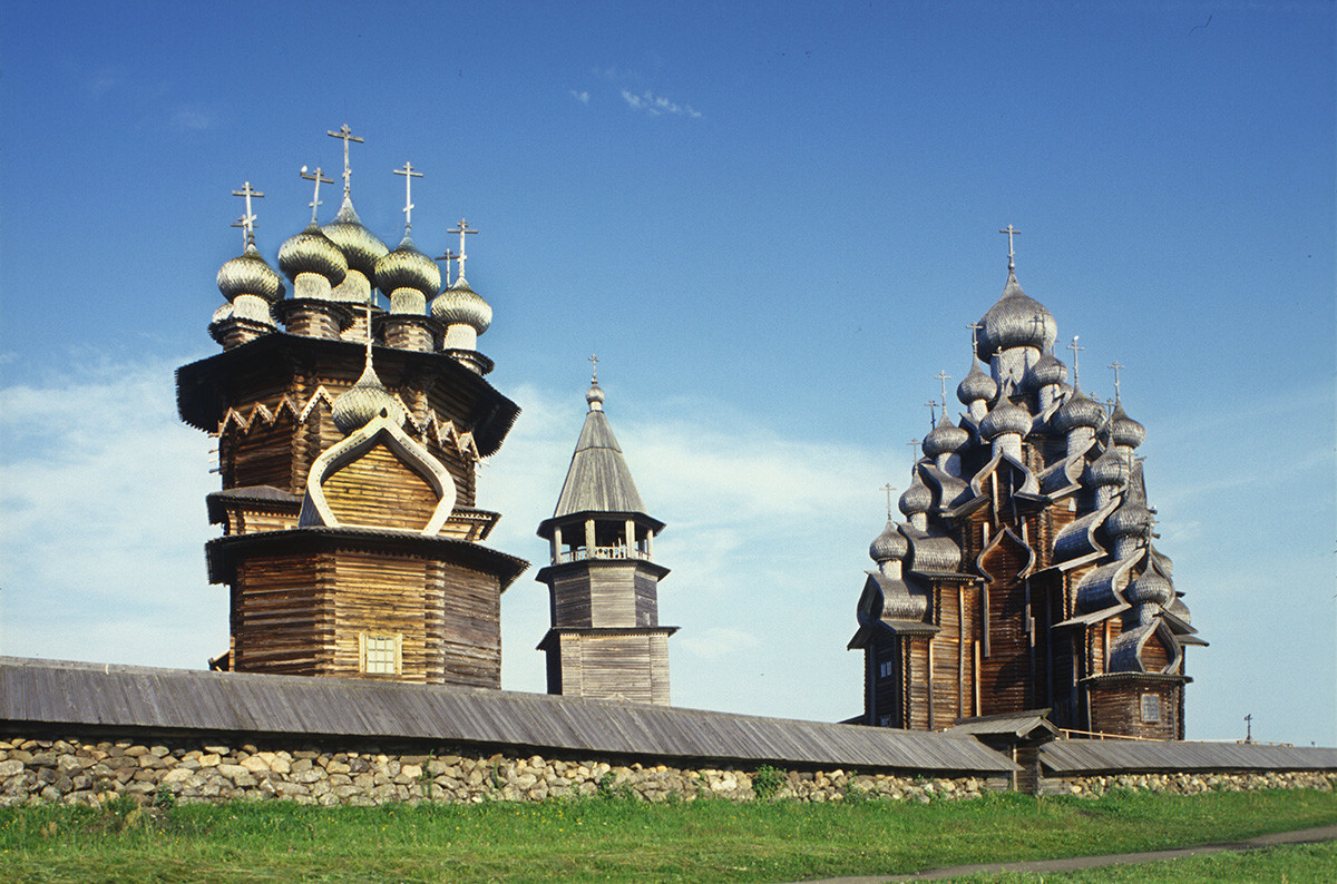 Kizhi pogost. Southeast view with fieldstone wall. From left: Church of the Intercession, bell tower, Church of the Transfiguration. July 13, 2007