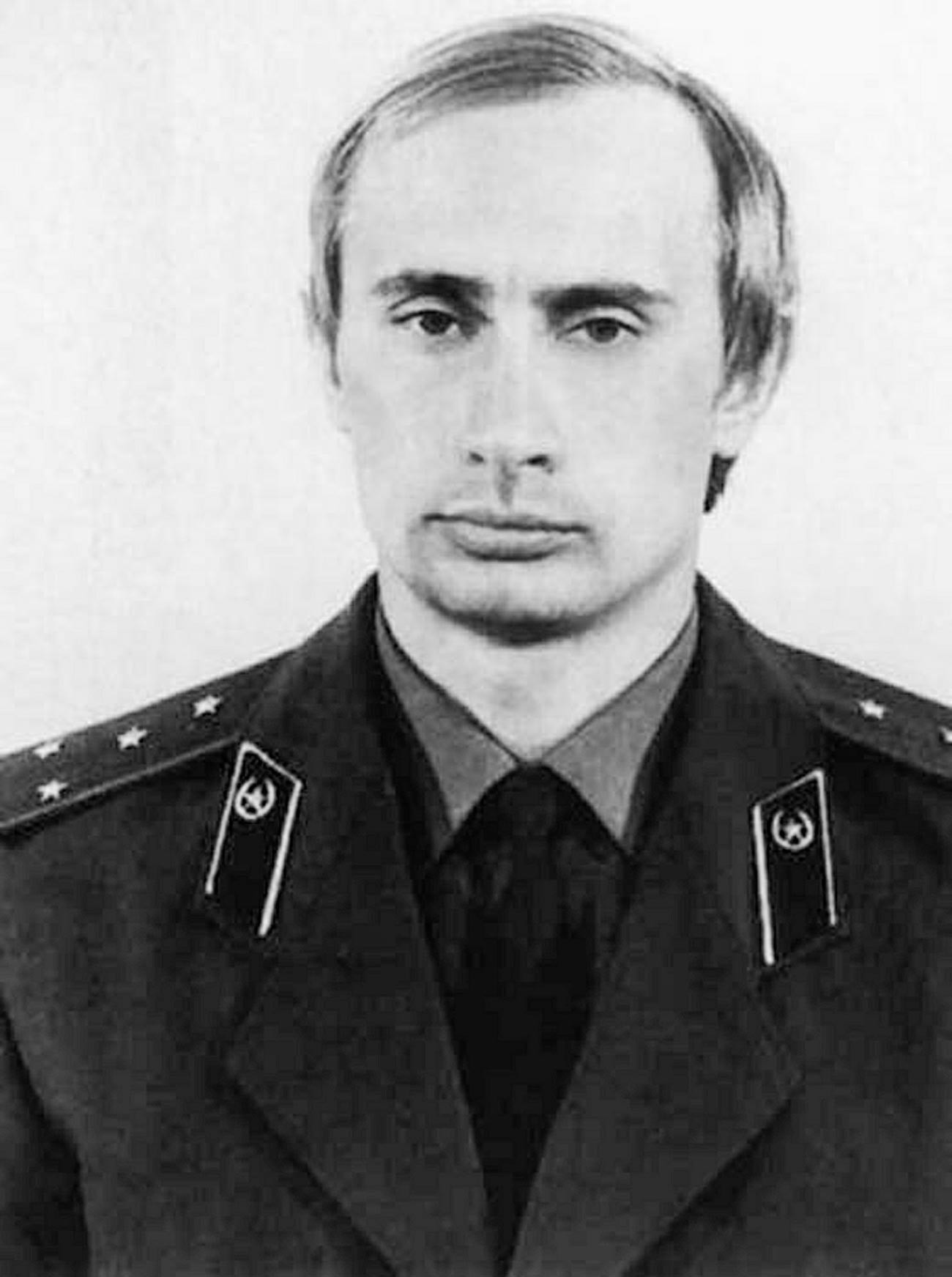 A young Vladimir Putin in a KGB uniform.