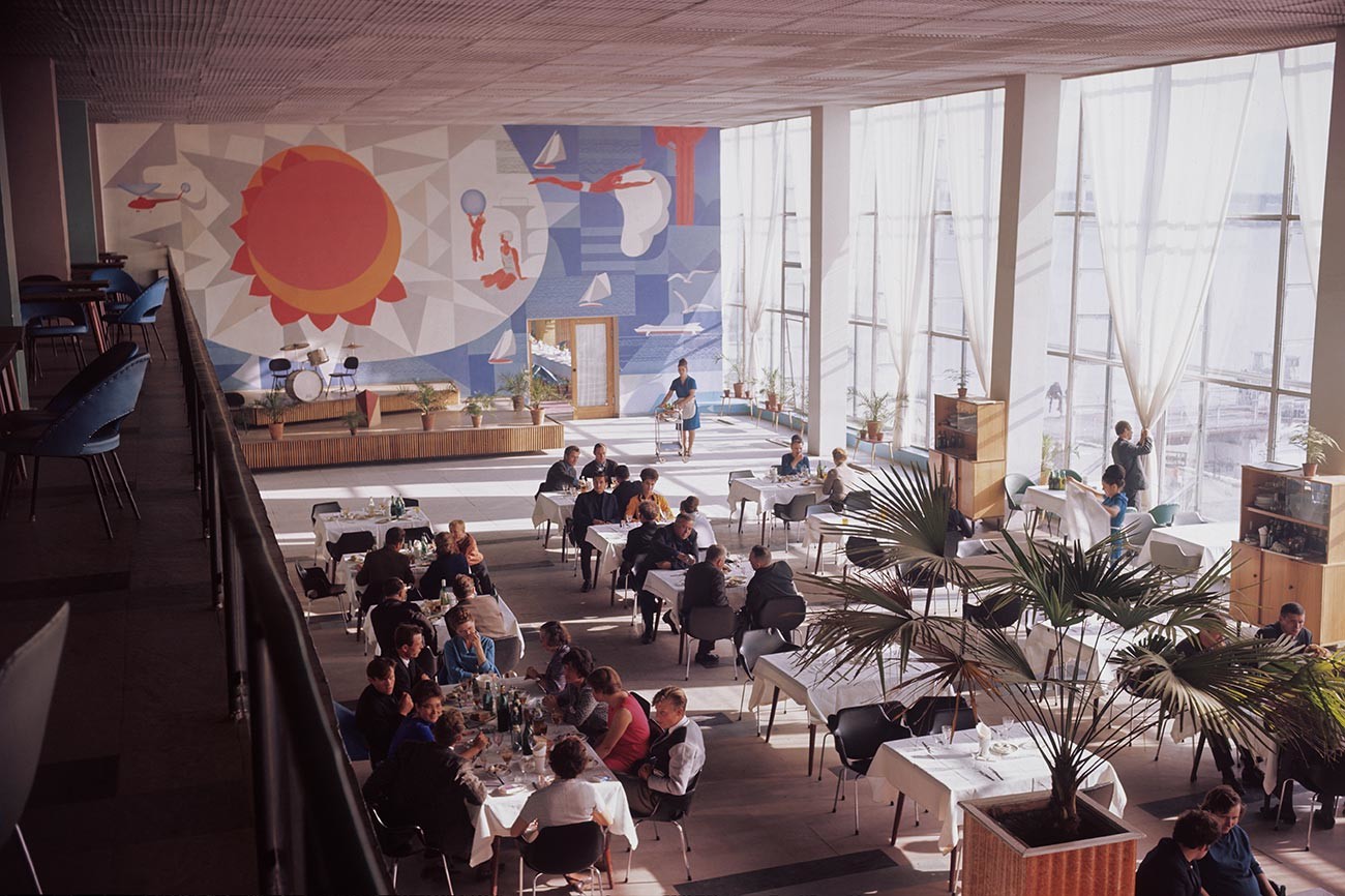 People visit a restaurant inside a river terminal in Omsk city, located at the confluence of the Om and Irtysh rivers, 1968.