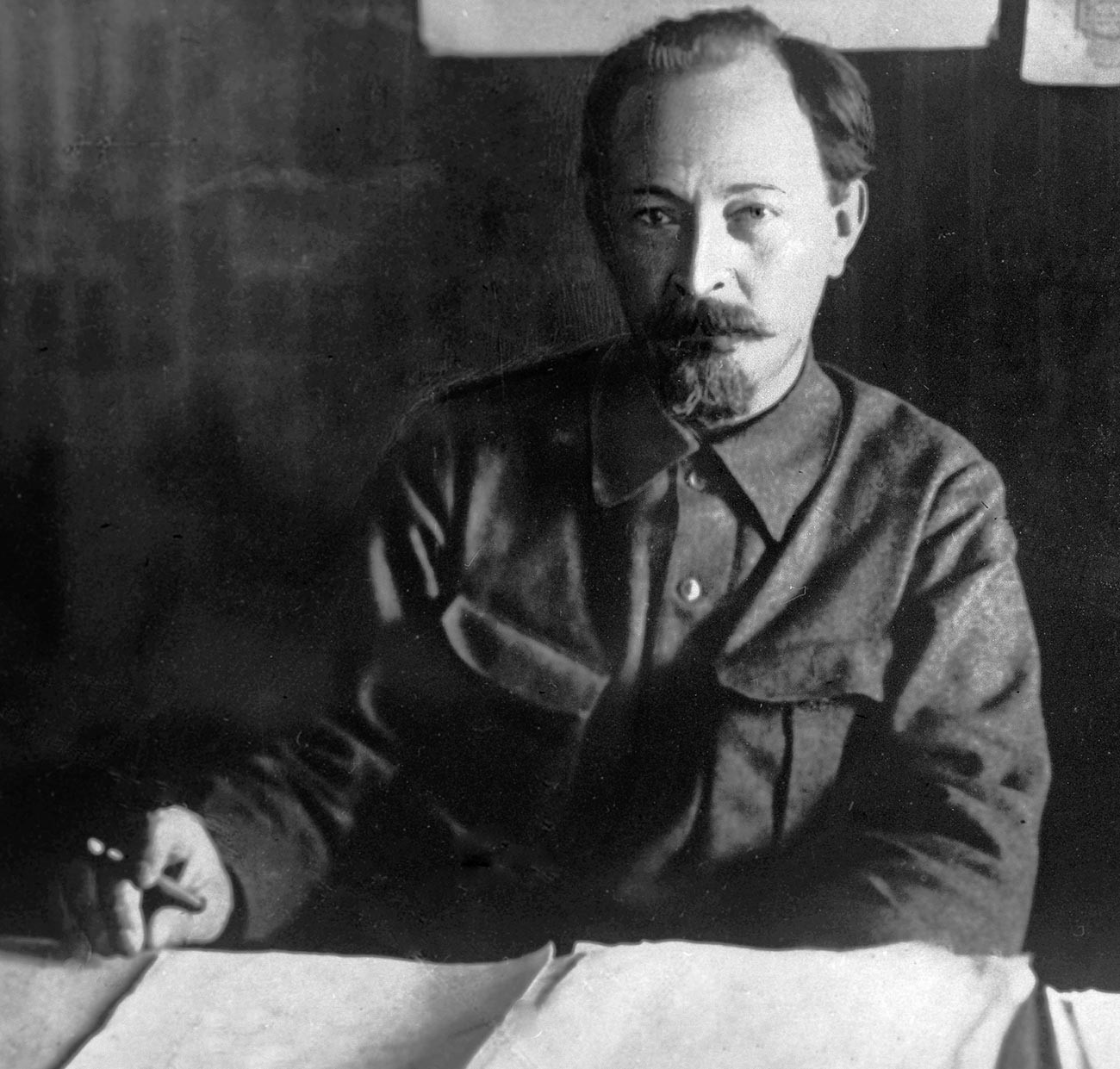 Felix Edmundovich Dzerzhinsky at his desk.