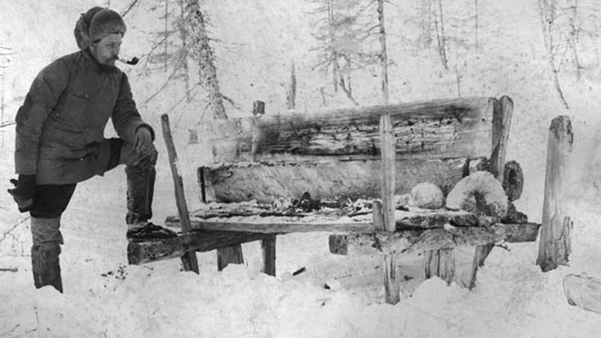 Ethnographer V. Vasilyev and a Yakut above-the-ground burial in Yenisey region, Siberia, 1905